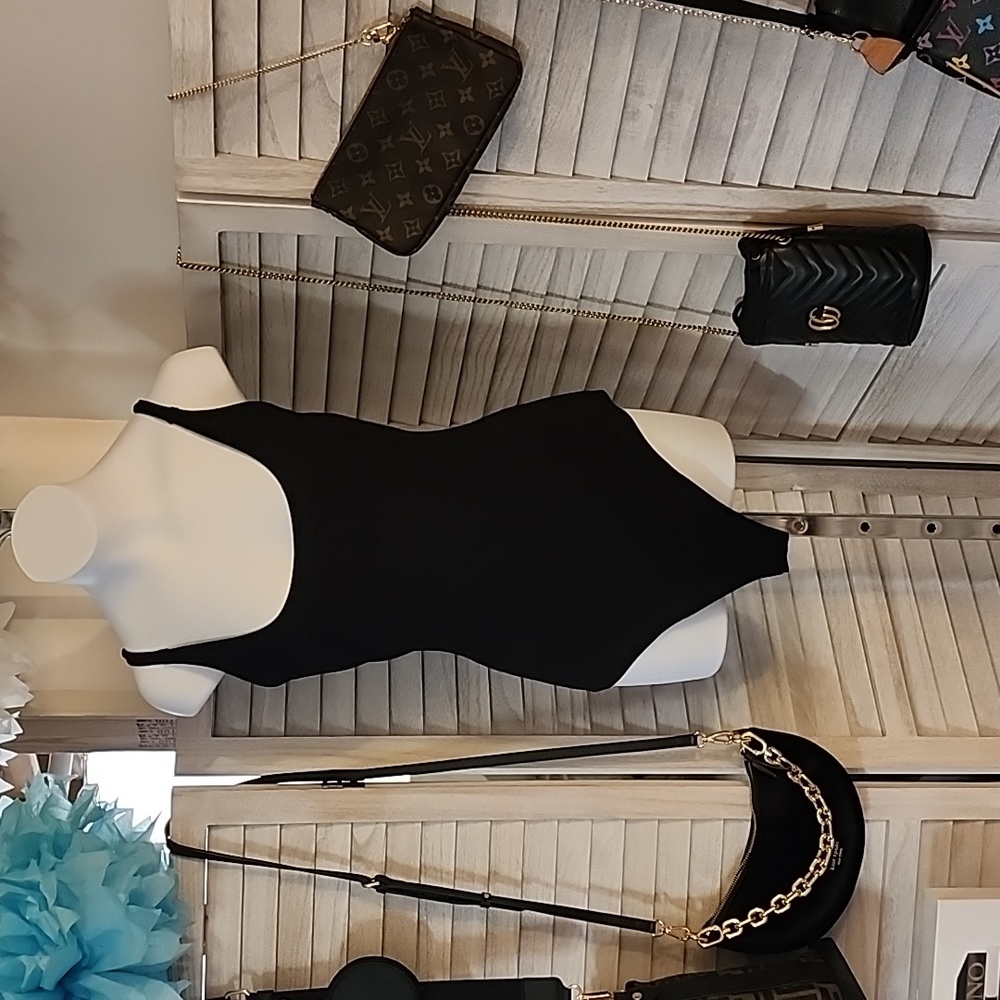 Shinestar brand black cotton blend bodysuit.